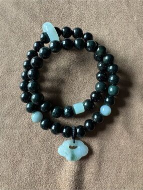Dark Green Beaded Burmese Jadeite Bracelet with Light Green Jade Accents.
